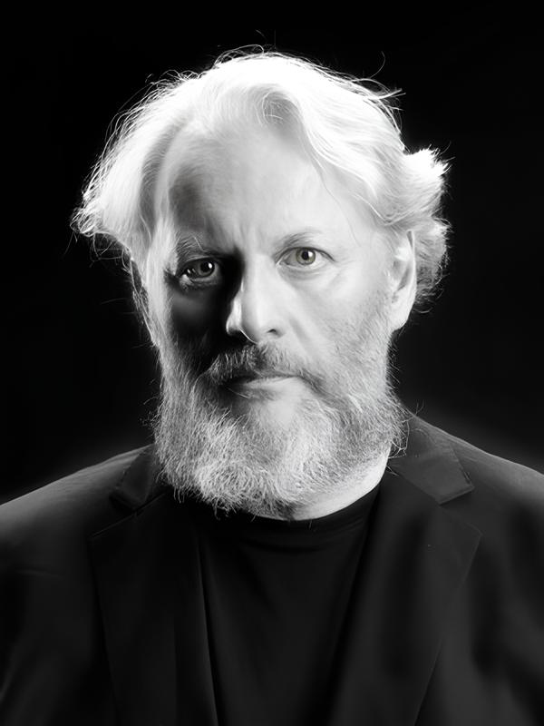 Bengt-Åke Lundin. A black and white photo of a man with a beard.