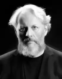 Bengt-Åke Lundin. A black and white photo of a man with a beard.