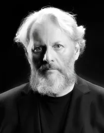 Bengt-Åke Lundin. A black and white photo of a man with a beard.