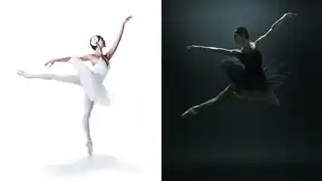 En ballerina i vit kostym balanserar på en tå, andra benet är sträckt bakåt, mitt emot henne en svartklädd ballerina som hoppar.