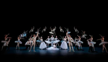 The Royal Ballet company dances on stage.